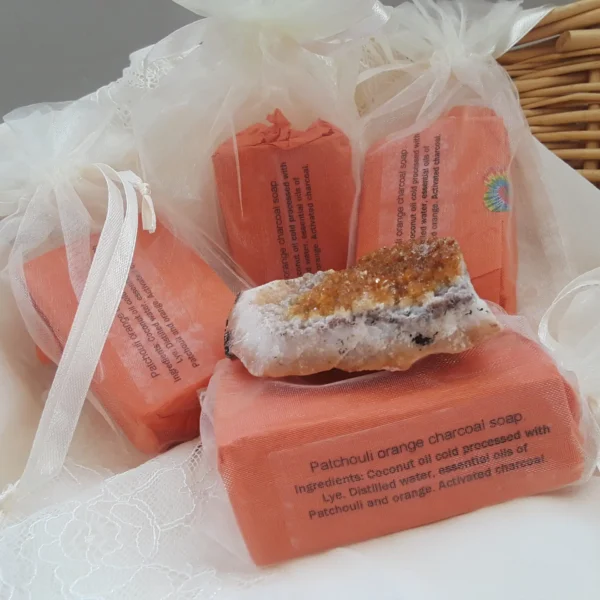 Patchouli Orange Charcoal Soap from Christopher's Organic Botanicals: Infused with the aromatic essences of patchouli and orange, crafted with cold-pressed coconut oil.
