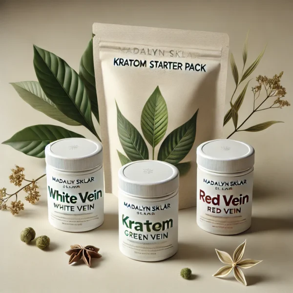 A minimalist product shot of the The Madalyn Sklar Kratom Starter Pack featuring three small containers labeled White Vein, Green Vein, and Red Vein Kratom, arranged on a smooth surface with subtle, natural elements like kratom leaves.